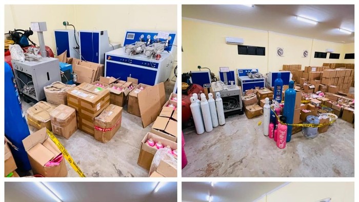 Petugas Bareskrim Polri memindahkan ribuan tabung Whip-Pink dan barang bukti gas N2O ke Gudang Brimob Cikeas